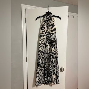 Beautiful, black and white printed party dress for any event. Very comfortable